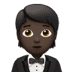 🤵🏿 person in tuxedo: dark skin tone display on Apple